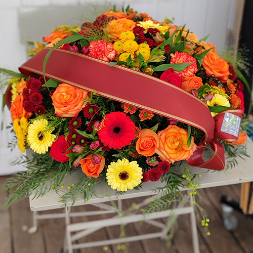 Grand coussin de deuil avec ruban et inscription personnalisable très colorée